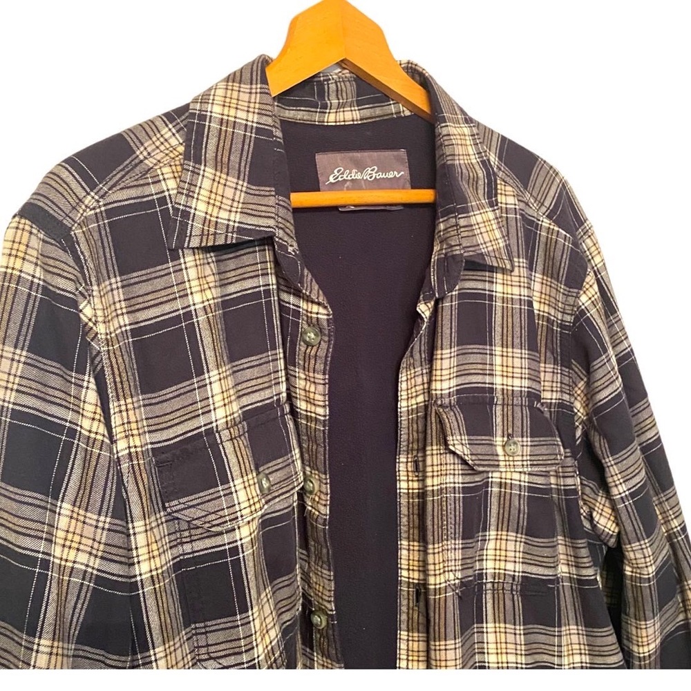 Eddie Bauer Outdoor Shacket. Has hand pockets and front button pockets.